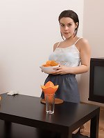 Ole Nina strips naked while enjoying an orange